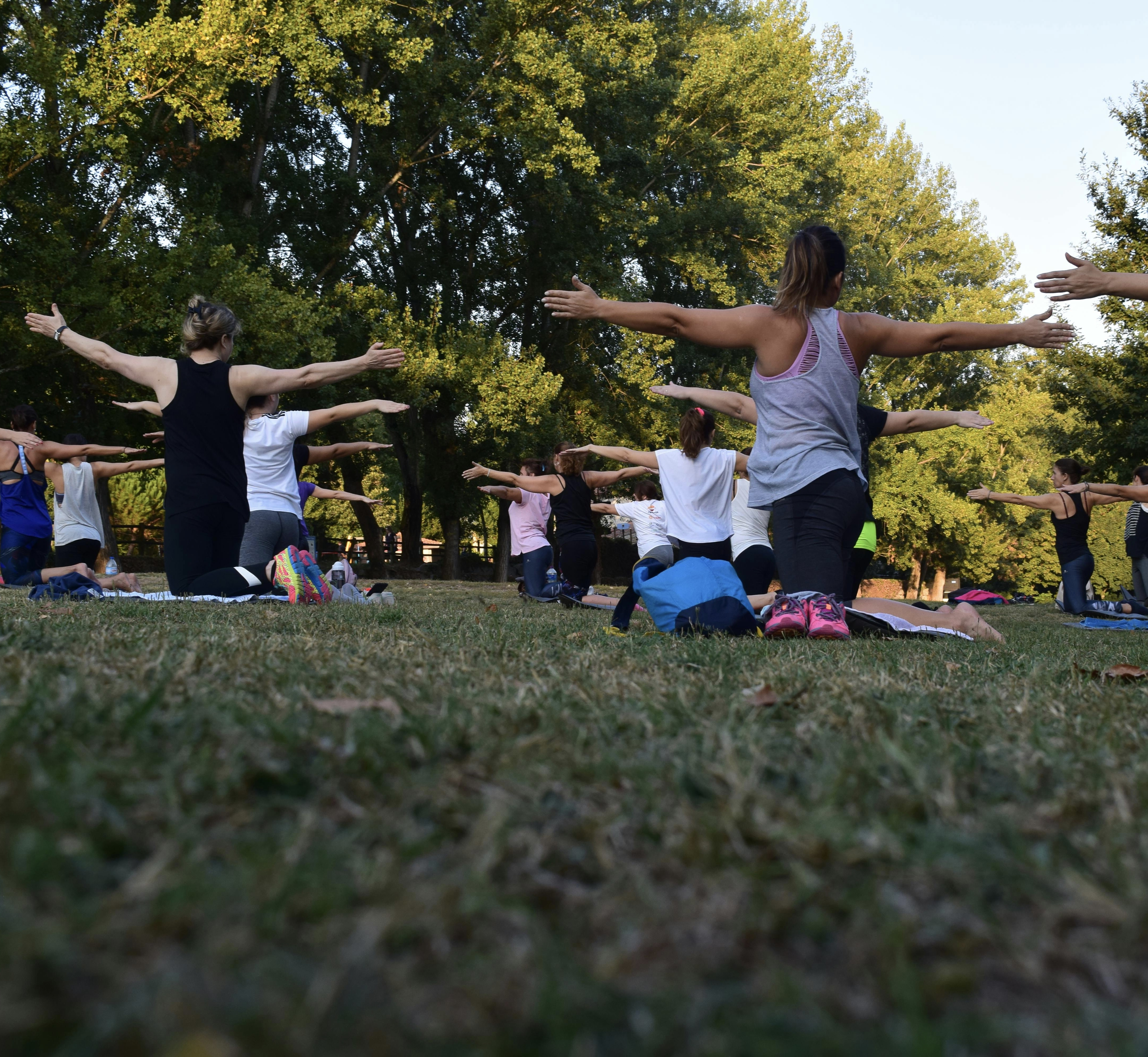 group yoga session in park