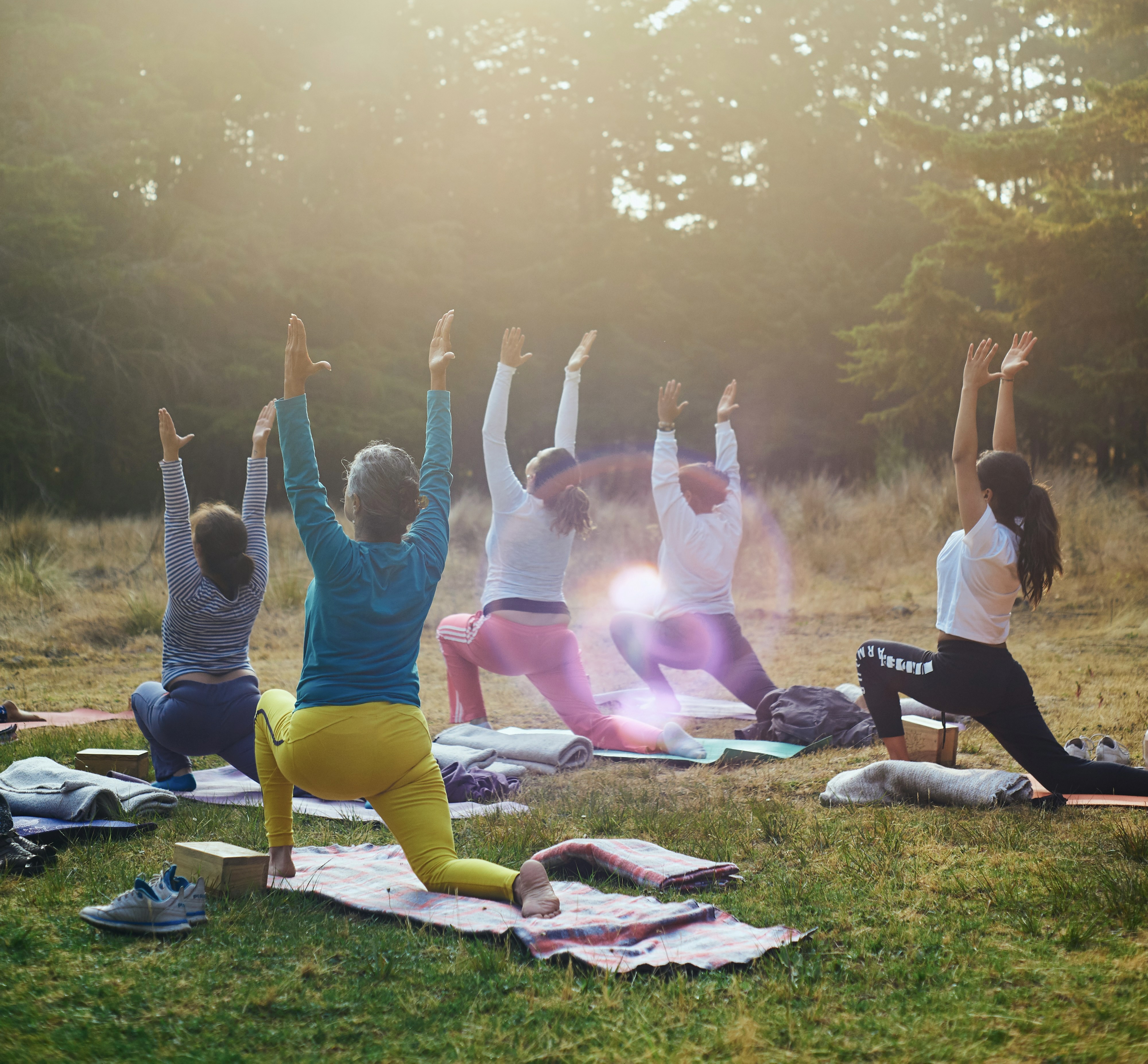 group yoga session in park
